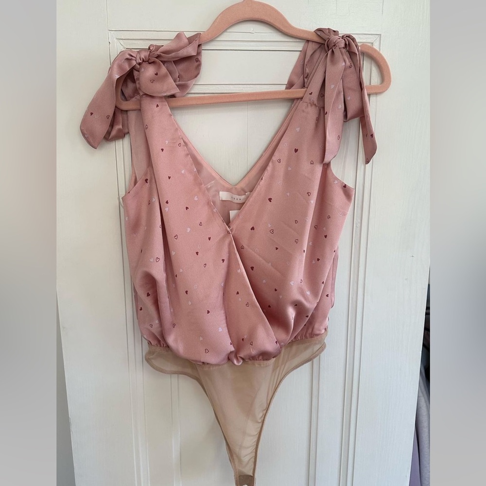 Bodysuit from boutique called ShopRiffRaff